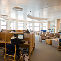 Interior view of Gonzaga student in the library.