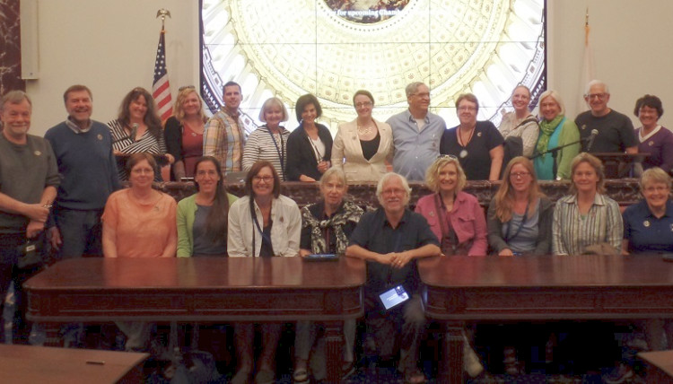 A group of conference attendees posed for a photo.