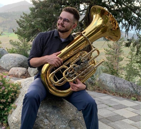 Image of Jordan George with instrument