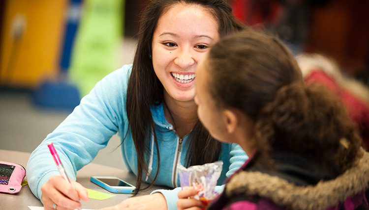 Gonzaga Math Tutoring Outreach Volunteer with Student