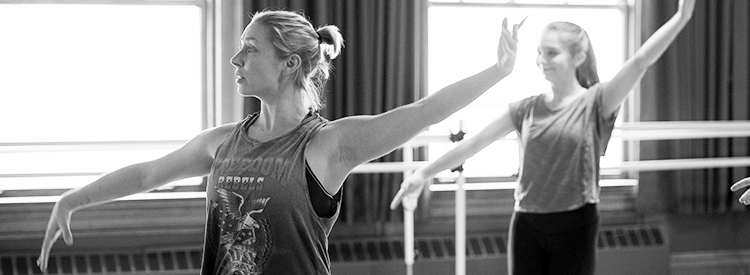 Sarah Fealk Adjunct Faculty at Gonzaga University Dance Department instructing students in the dance studio.