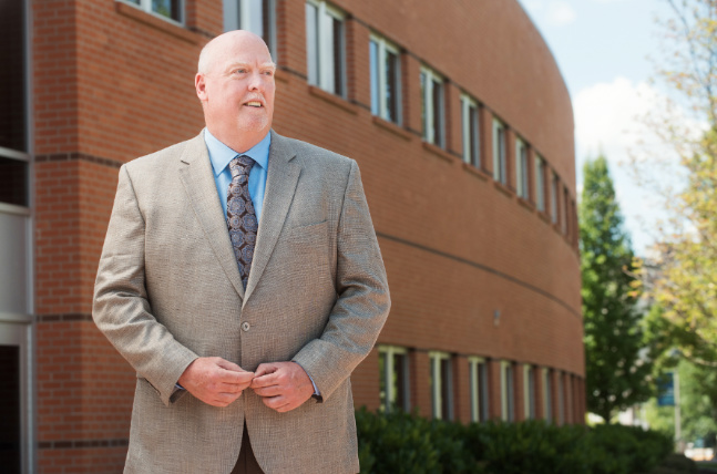 Ken Anderson in front of the Jepson building