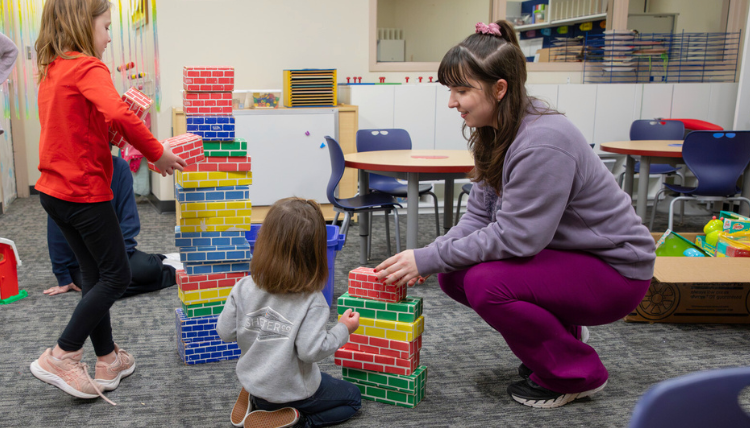 BCBA student works with child in clinical experience