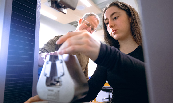 Student and professor in human physiology lab