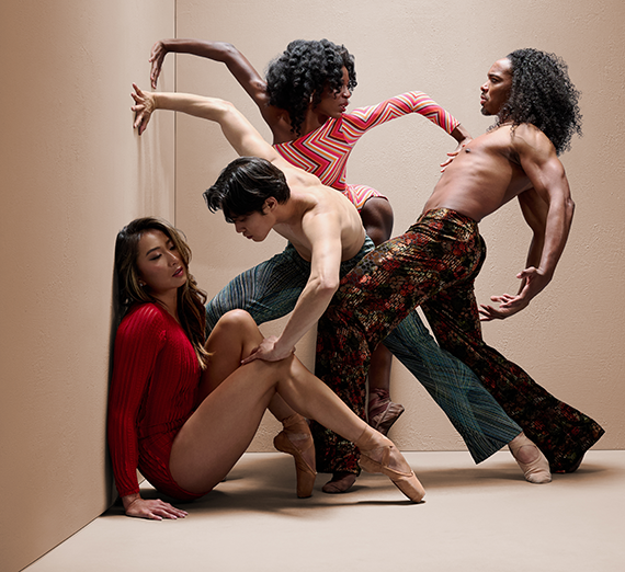 Members of Complexions Ballet posed in a dance move together.