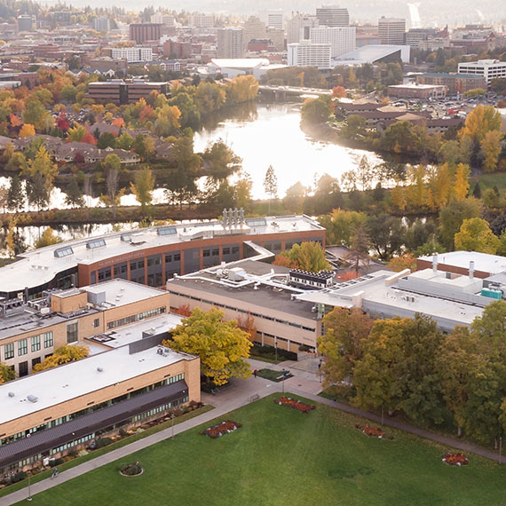 Aerial view of campus downtown Spokane divided by the river 