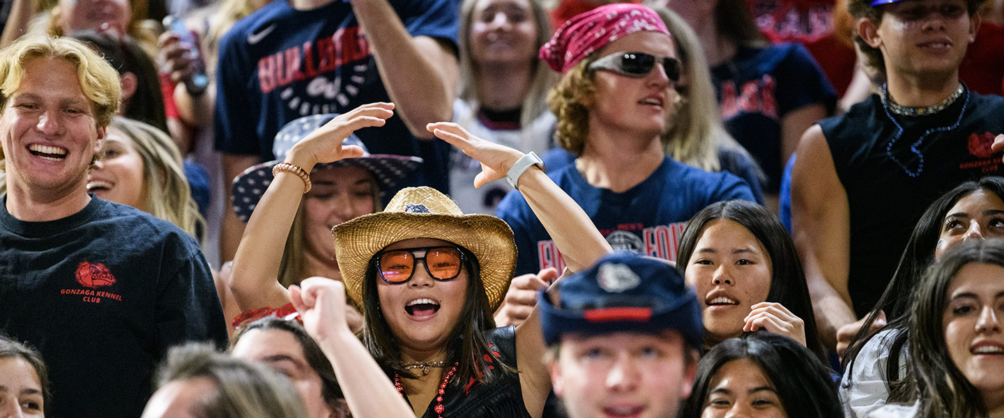 Students cheer at a Gonzaga basketball game.