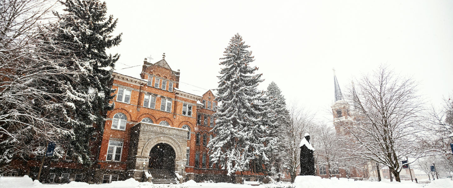 Snow covered College Hall on campus.