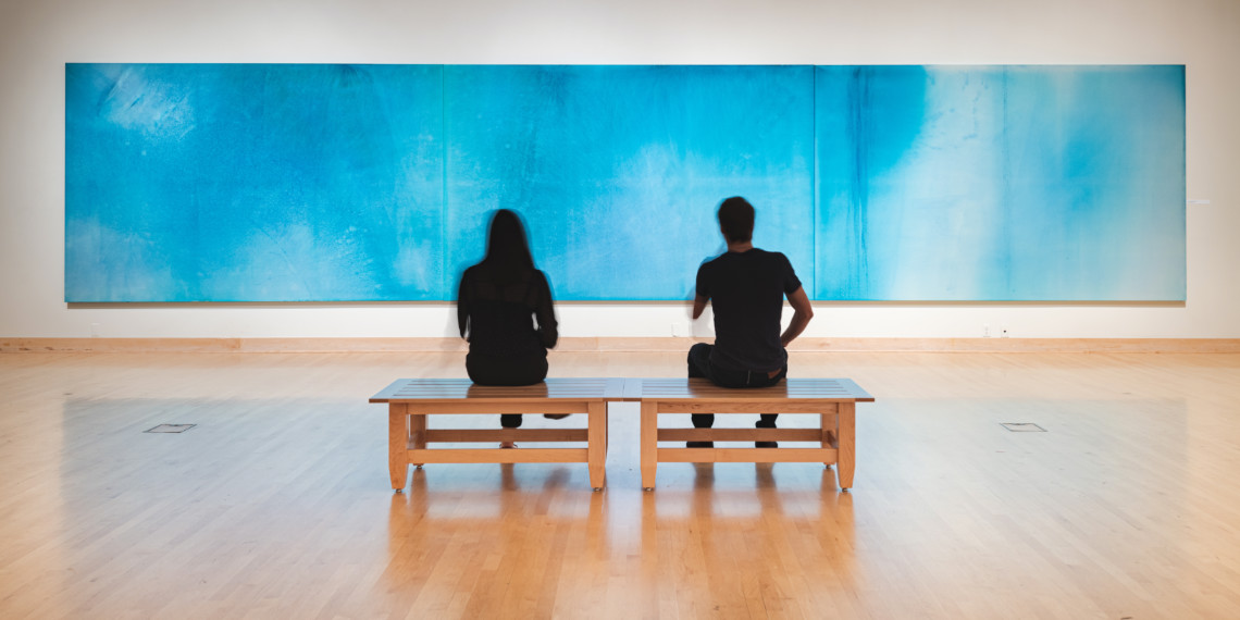 Students viewing artwork by Makoto Fujimura.
