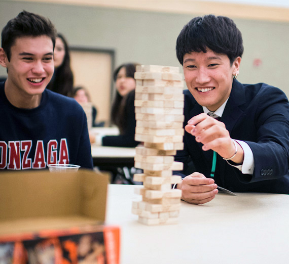 Students playing the game Jenga