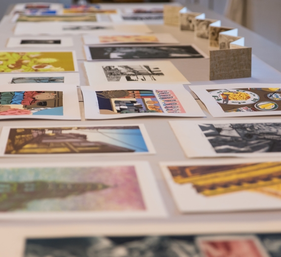 Student art work displayed on a table