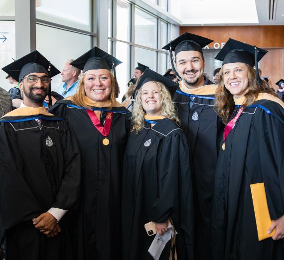 Counselor Education Graduate posing for picture