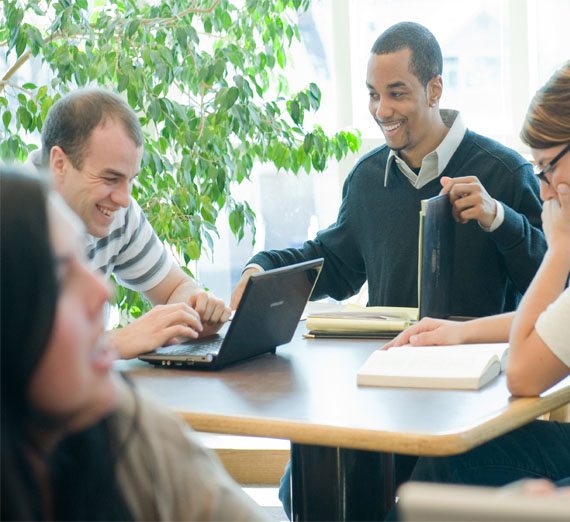 Students working together on assignment  