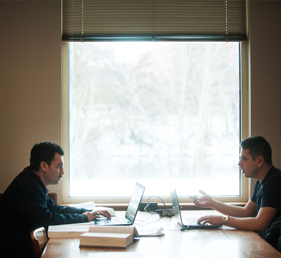 students studying on laptops