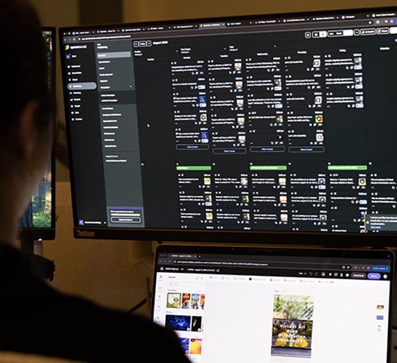 Women works at desk with social media scheduler on screen