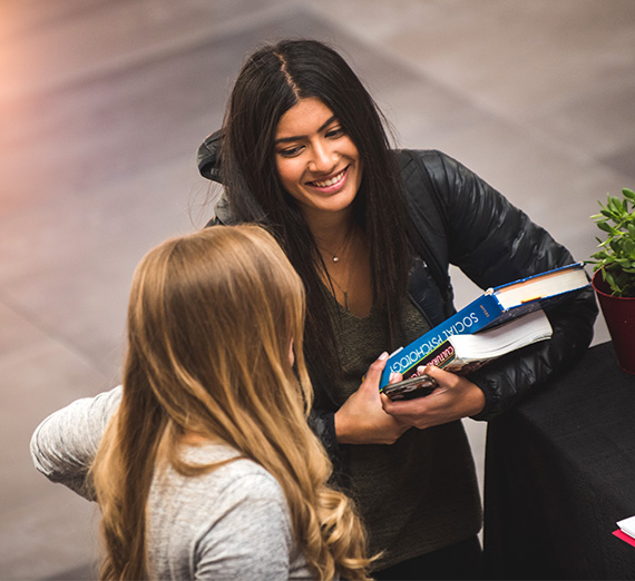 two female students talking