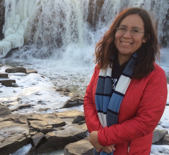 Brenda Velasco standing in front of Sioux Falls