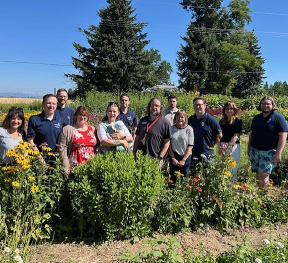 Members of GUEST pose together for a team photo