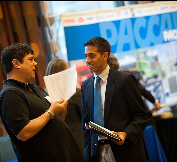 Employer, student at networking event.