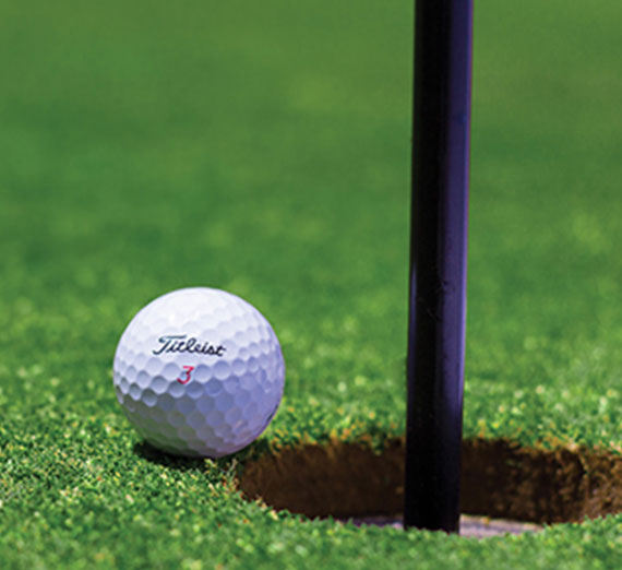 Golf ball near hole