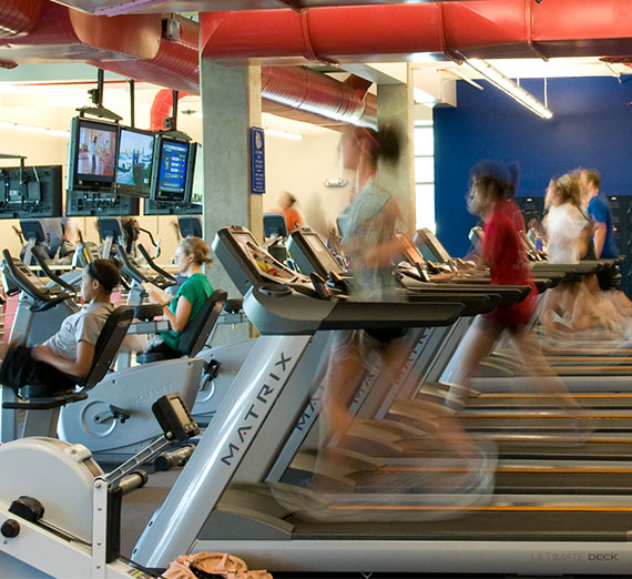 Students on treadmills at Rudolf Fitness Center.