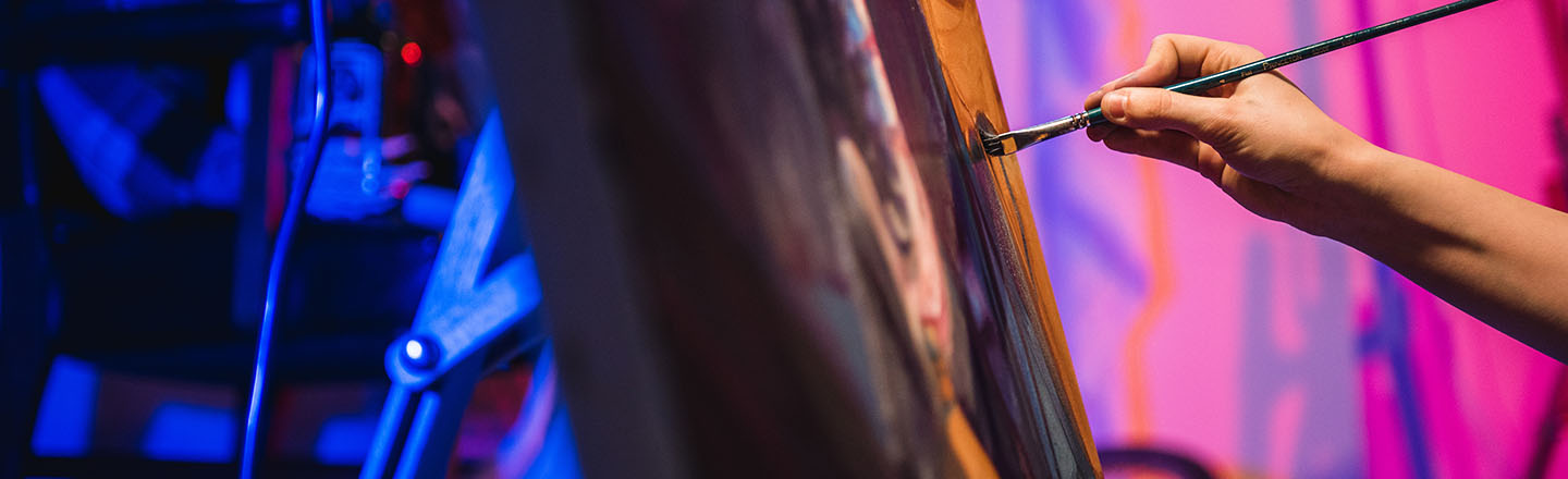 Close up of student paining