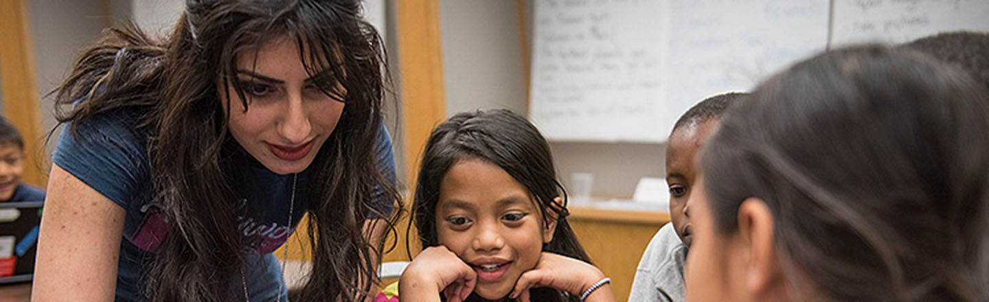 ESL Teacher with Students in Classroom