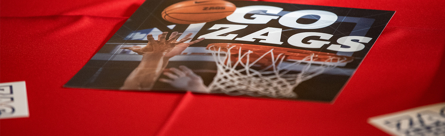 close-up of a GO ZAGS cheer card 