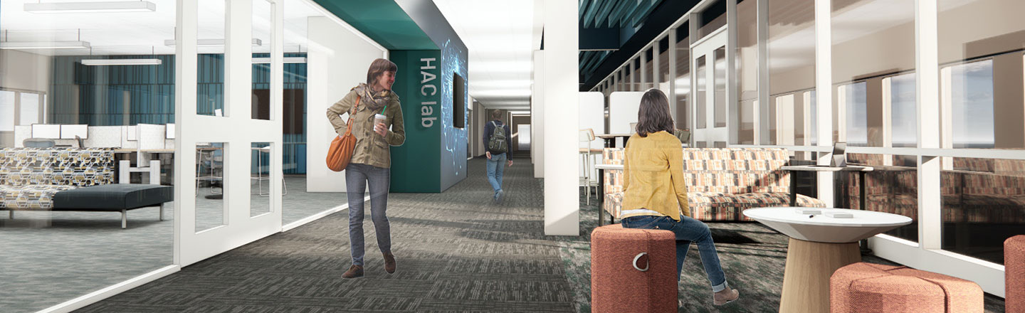 Modern hallway with glass-walled lounge, “HAC lab” sign, and two people in view.
