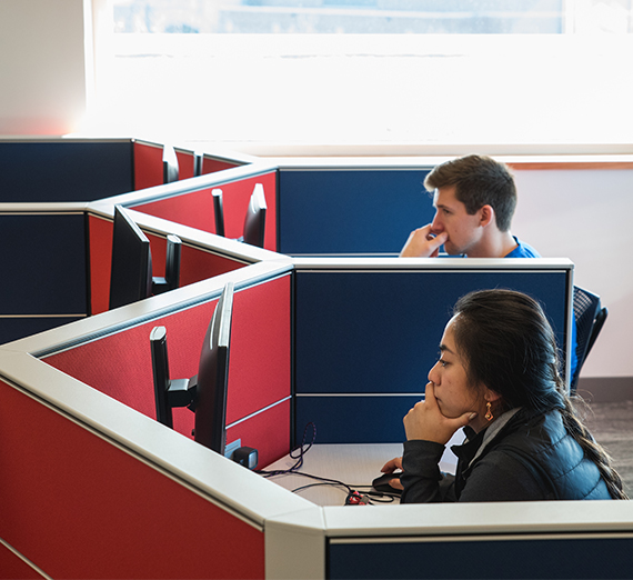 male and female students study in the Volkar Center for Athletic Achievement