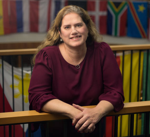 CAS Associate Dean and GU Model UN faculty advisor Stacy Taninchev poses on Hemmingson Center's third floor.