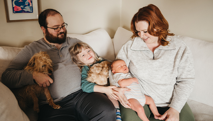 Amanda Dawson and Kevin Tongue with newborn Milo and big sister Lyra.