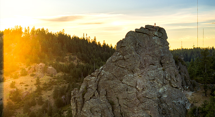 A Gonzaga student rock climbs.