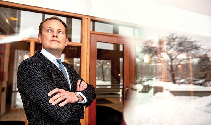 New dean of law school Jacob Rooksby stands outside. 