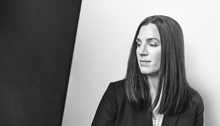 black and white reflective image of a woman