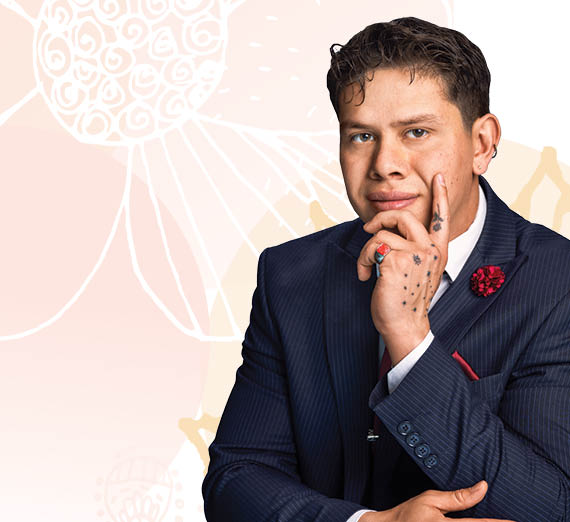 man in suit against flower background