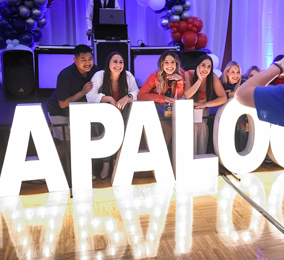 alumni gather for photo