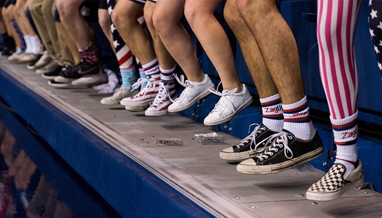 feet stomp on bleachers