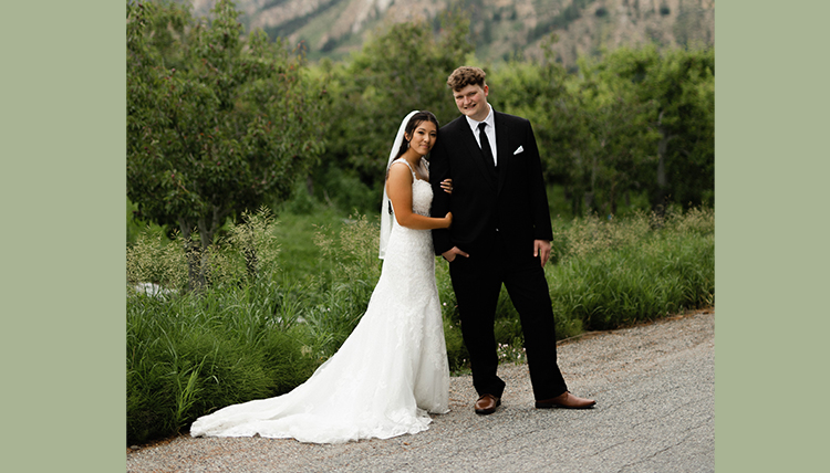 ’22, ’23 Taylor Takasugi and Dylan Parrish's wedding portrait.