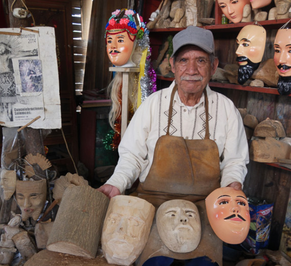 Mask artist from Michoacan, Mexico displays his work