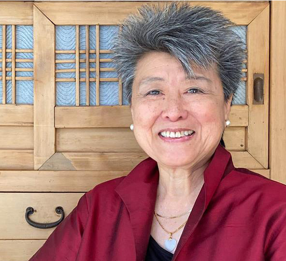 Helen Zia smiling into camera