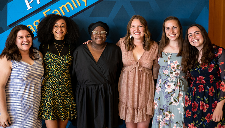 six female students posing together