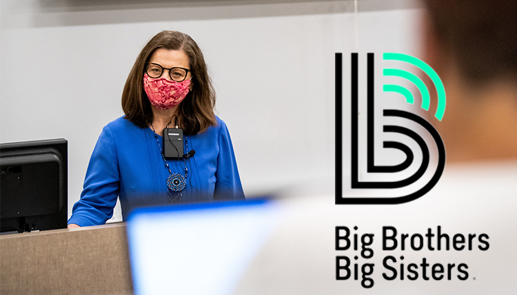 woman teaches to in-person and online students and Big Brothers Big Sisters logo is shown