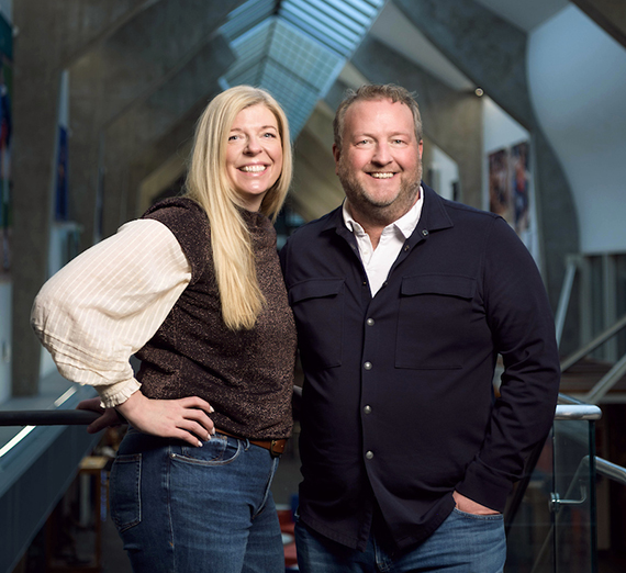 Katie and Ryan Harnetiaux stand in the Gonzaga Hall of Honor