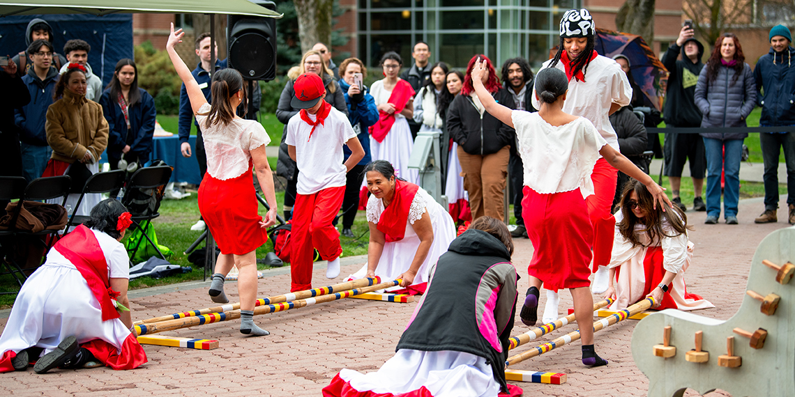 The Filipino-American Association of the Inland Empire dancing the tinikling.