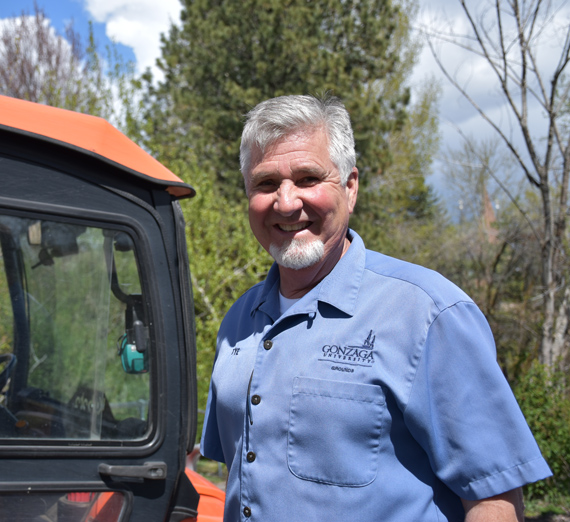Tye McGee, Groundskeeper Supervisor outside.