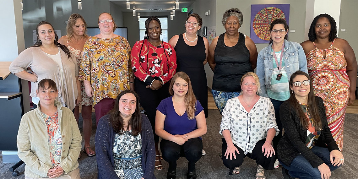 A group of women smiling