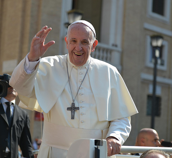 Pope Francis, seen here waving to a crowd, passed away on April 21, 2025. The Catholic Church will now hold funeral liturgies and begin the process of electing a new pope.