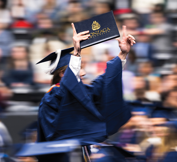 woman in black against yellow vibrant background