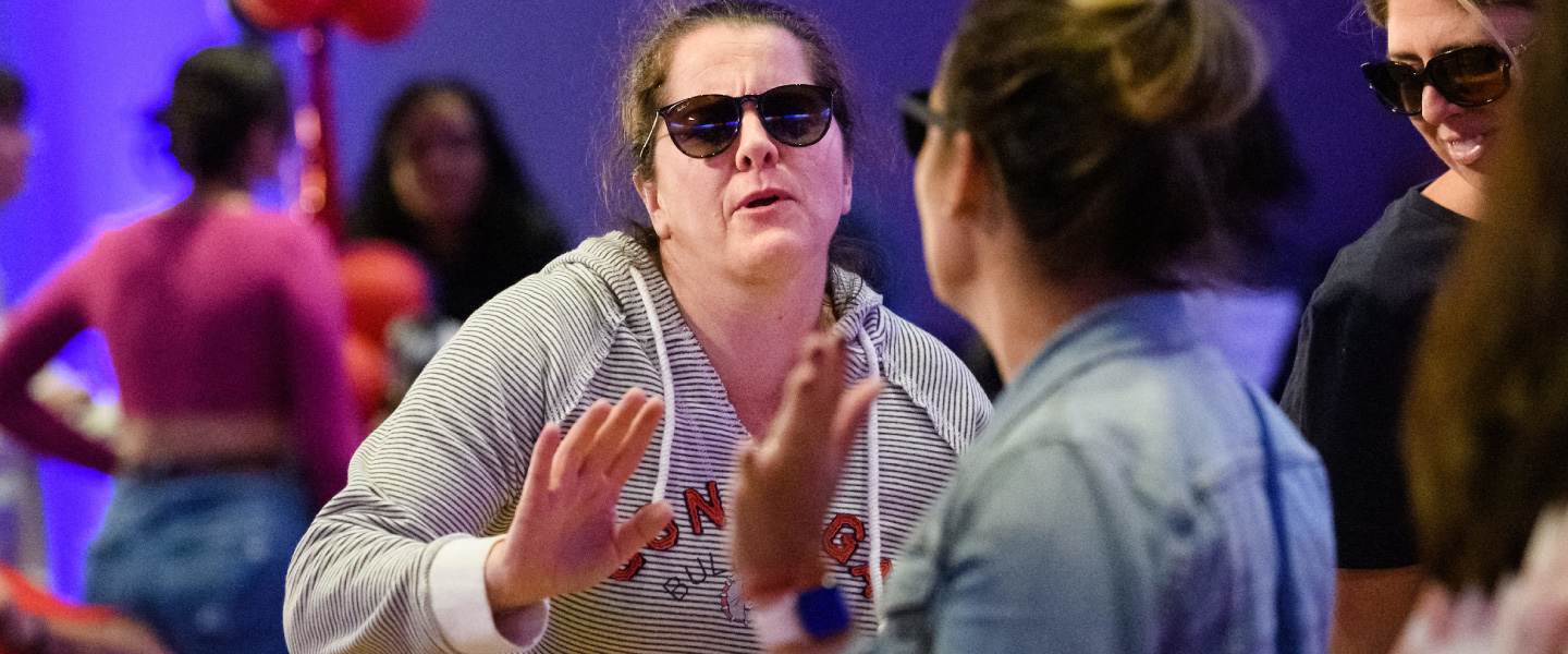 Two Gonzaga alumna dance at the 2022 Zagapalooza event, all-class reunion